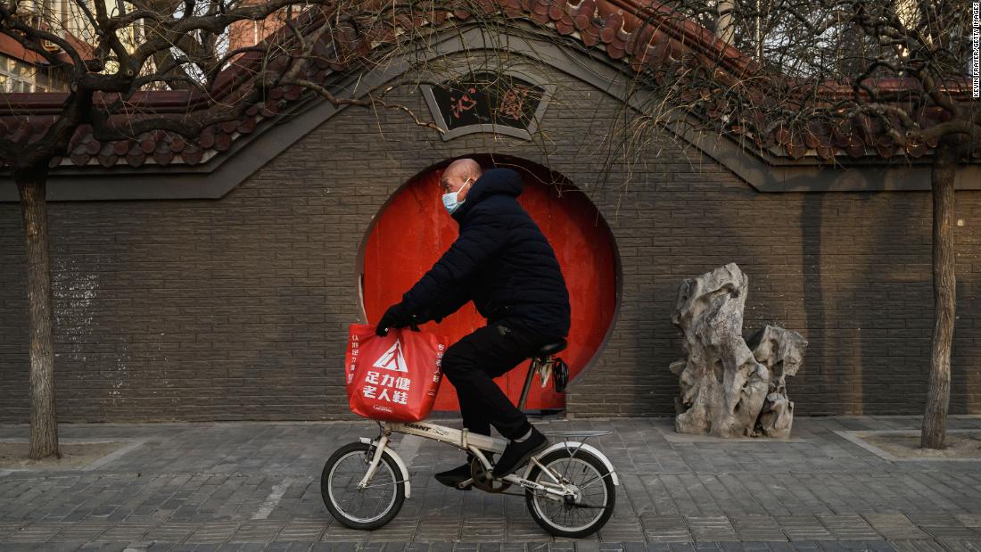 A man rides his bike in Beijing on February 23.